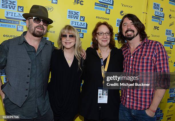 Musicians Dave Stewart, Stevie Nicks, Janet Pierson, Producer SXSW and Dave Grohl arrive at the screening of "In Your Dreams:Stevie Nicks" during the...