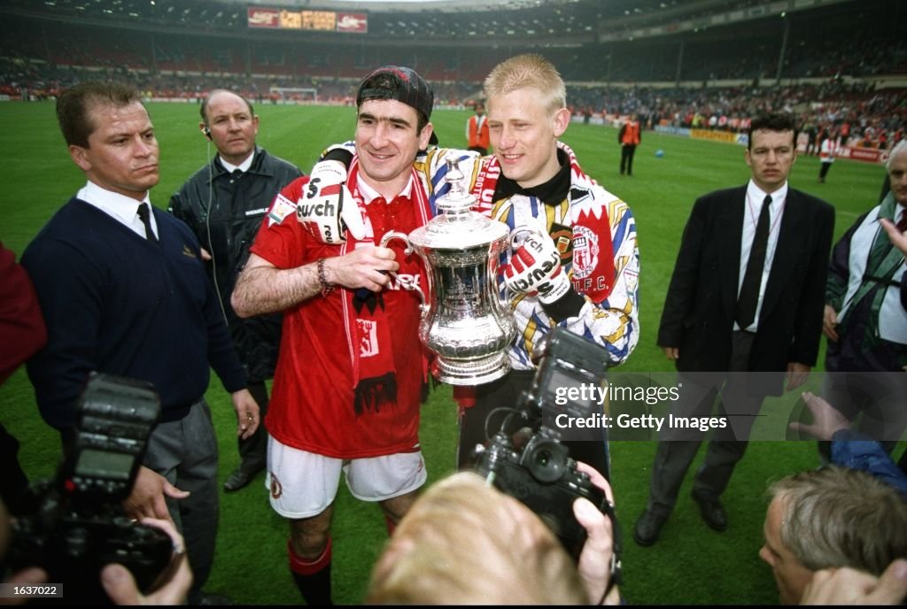Eric Cantona and Peter Schmeichel of Manchester United