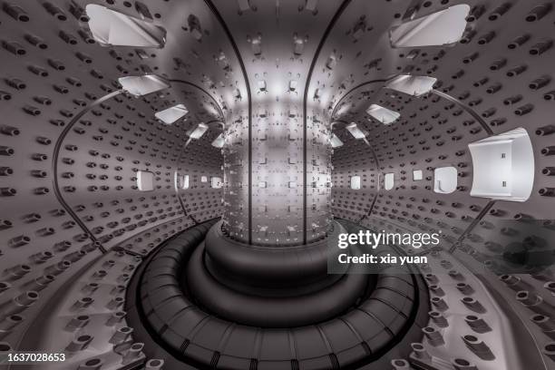 interior of the vacuum vessel of tokamak - kernfusie stockfoto's en -beelden