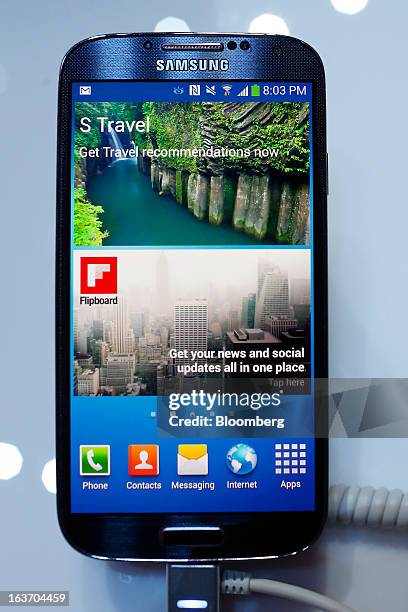 Samsung Electronics Co. Galaxy S4 smartphone sits on display during an event at Radio City Music Hall in New York, U.S., on Thursday, March 14, 2013....