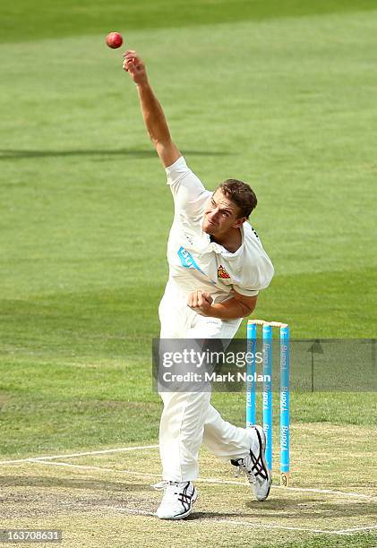 Luke Butterworth of Tasmania bowls during day two of the Sheffield Shield match between the Tasmania Tigers and the Victoria Bushrangers at...