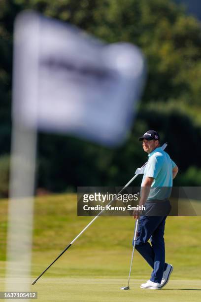 Chris Currie stands on the 2nd green on the Final Day of the Loch Lomond Whiskies Scottish PGA Championship at Scotscraig Golf Club on September 1,...