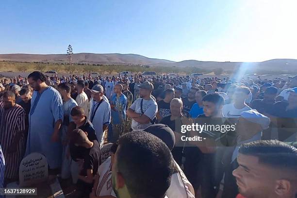 Mourners attend the funeral of Bilal Kissi, shot dead by the Algerian coastguard when he and a fellow jet skier strayed across the maritime border...