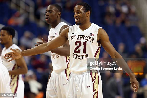 Michael Snaer of the Florida State Seminoles reacts after a play against the Clemson Tigers during the first round of the Men's ACC Basketball...