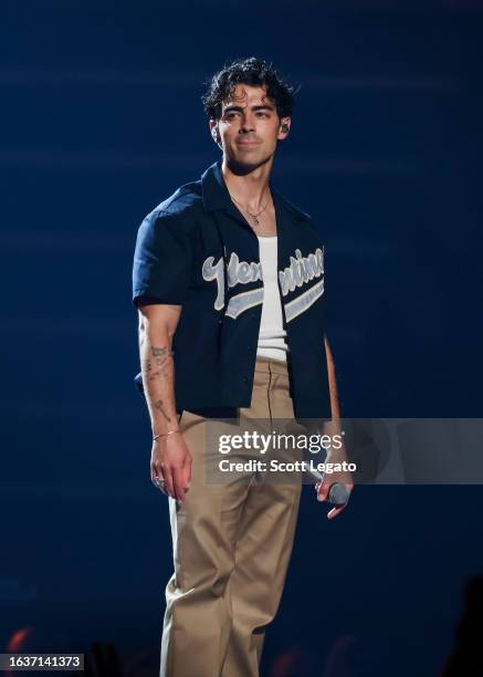 Joe Jonas performs onstage during Jonas Brothers “Five Albums, One Night” Tour at Little Caesars Arena on August 24, 2023 in Detroit, Michigan.