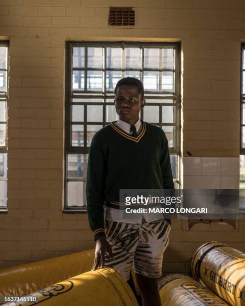 Thabiso Rikhotso from the Jabulani Technical Secondary School U16 rugby team poses for a portrait at the school in Soweto, on May 25, 2023.