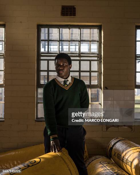 Ntanto Manentsa from the Jabulani Technical Secondary School U16 rugby team poses for a portrait at the school in Soweto, on May 25, 2023.