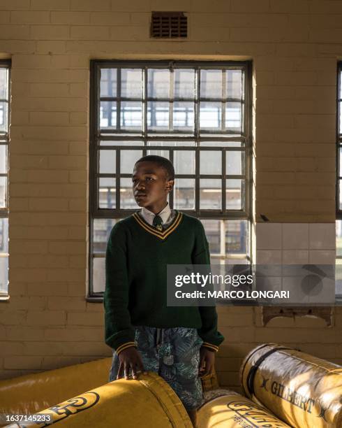 Lesedi Moleko from the Jabulani Technical Secondary School U16 rugby team poses for a portrait at the school in Soweto, on May 25, 2023.
