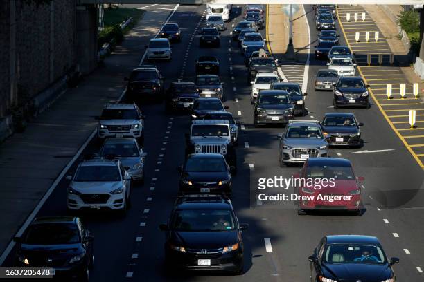 Automobile traffic moves along Interstate 395 on Friday morning September 1, 2023 in Washington, DC. The American Automobile Association projects...