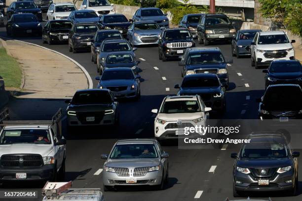 Automobile traffic moves along Interstate 395 on Friday morning September 1, 2023 in Washington, DC. The American Automobile Association projects...