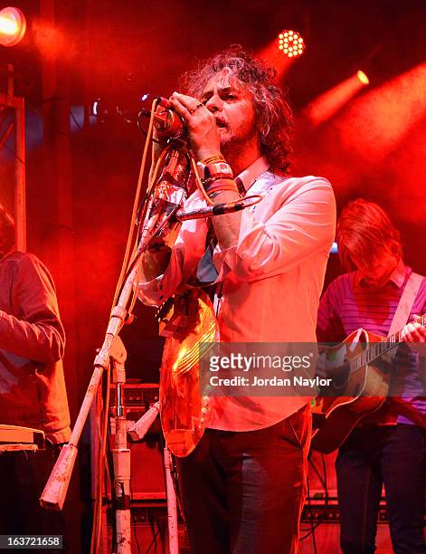 Singer Wayne Coyne of The Flaming Lips performs onstage at the Warner Bros Music Showcase during the 2013 SXSW Music, Film + Interactive Festival at...