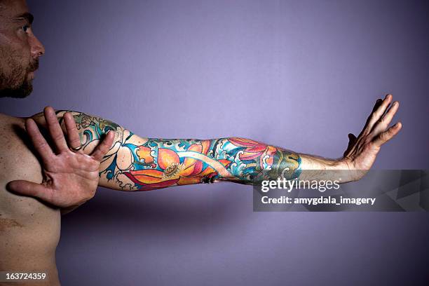 tattoo portrait - tattoo arm stockfoto's en -beelden