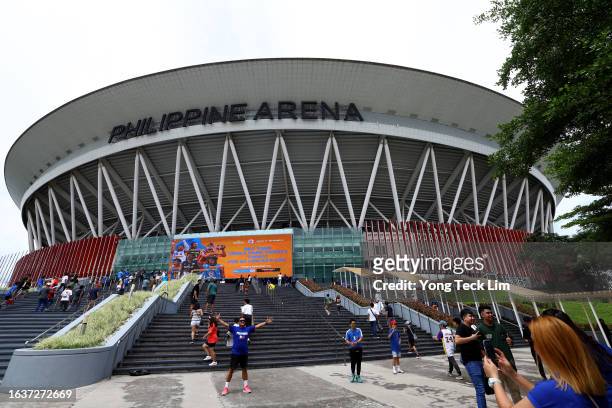 Fans arrive prior to the FIBA World Cup opening and Group A games at the Philippine Arena on August 25, 2023 in Bulacan, Philippines.