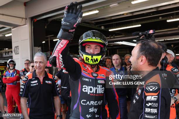 Aprilia Spanish rider Aleix Espargaro waves after the second MotoGP free practice session of the Moto Grand Prix of Catalonia at the Circuit de...