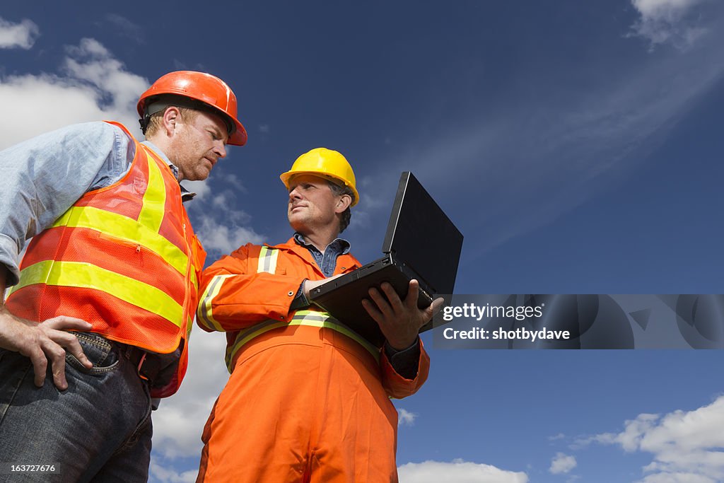 Contractor On Computer Contractors And Computer High-Res Stock Photo - Getty Images