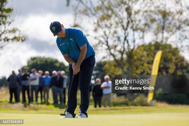 Graeme Robertson putts for birdie on the 18th green on the Final Day of the Loch Lomond Whiskies Scottish PGA Championship at Scotscraig Golf Club on...