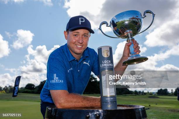 Graeme Robertson poses with the trophy after winning the PGA Scottish Championship on the Final Day of the Loch Lomond Whiskies Scottish PGA...