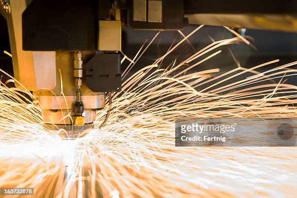 high-tech metal cnc, cutting laser tool in use. - cutting stock pictures, royalty-free photos & images