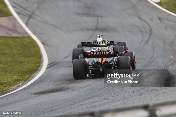 Rear view of the race car of Lando Norris of Great Britain with sparkles, driving the car no 4 a Mercedes MCL60 of McLaren F1 Team on truck during...
