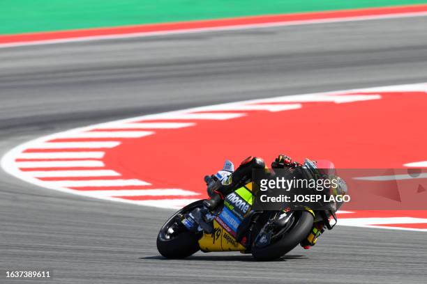 Aprilia Spanish rider Maverick Vinales rides during the second MotoGP free practice session of the Moto Grand Prix of Catalonia at the Circuit de...