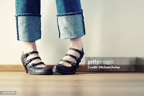 bashful feet - rolled up pants stockfoto's en -beelden