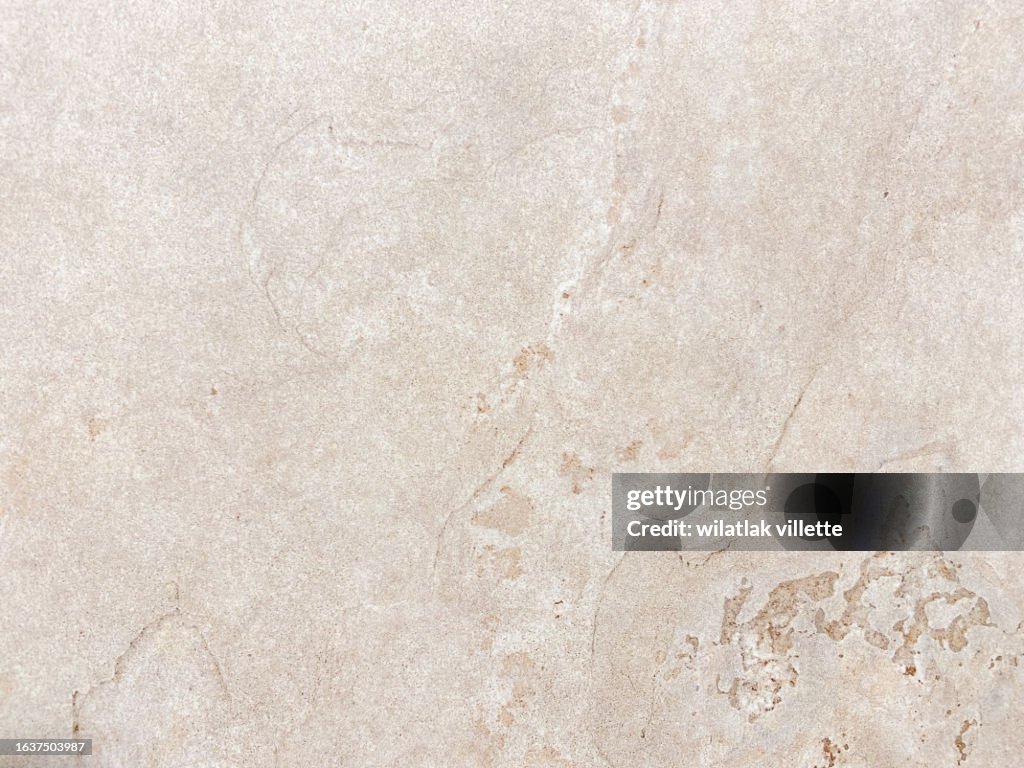 Light orange colored plastered textured wall