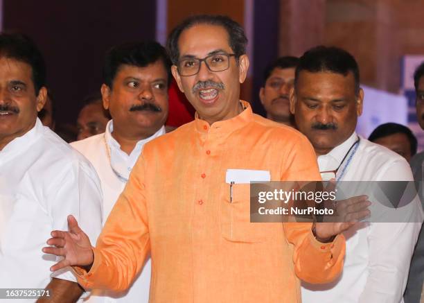 Shiv Sena chief Uddhav Thackeray greets as he arrives to attend a meeting of INDIA, an alliance of Uddhav Thackerayopposition parties, in Mumbai,...