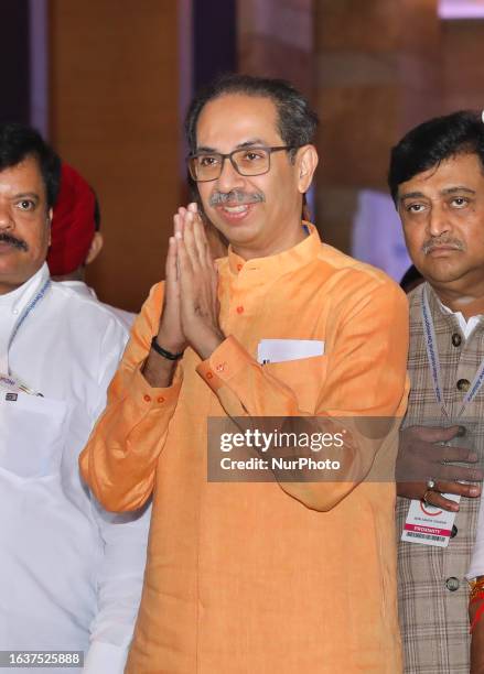 Shiv Sena chief Uddhav Thackeray greets as he arrives to attend a meeting of INDIA, an alliance of Uddhav Thackerayopposition parties, in Mumbai,...