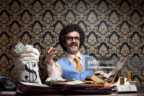 rich man posing with money bags, gold bullions, dollar bills - money bag 個照片及圖片檔