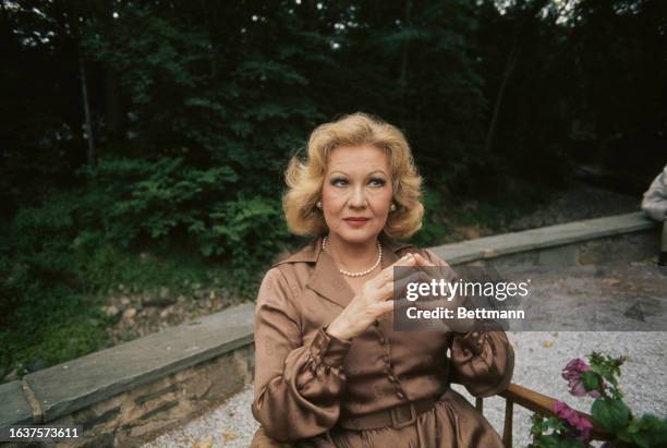 American actress Virginia Mayo pictured in a garden in New York, June 27th 1977.