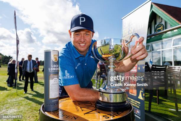 Winner Graeme Robertson with his haul of trophies and whisky following his win on the Final Day of the Loch Lomond Whiskies Scottish PGA Championship...