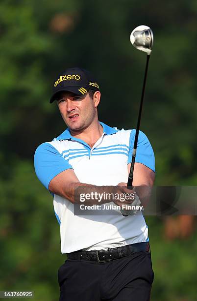 Gareth Maybin of Northern Ireland tees off during day two of the Avantha Masters at Jaypee Greens Golf Club on March 15, 2013 in Delhi, India.