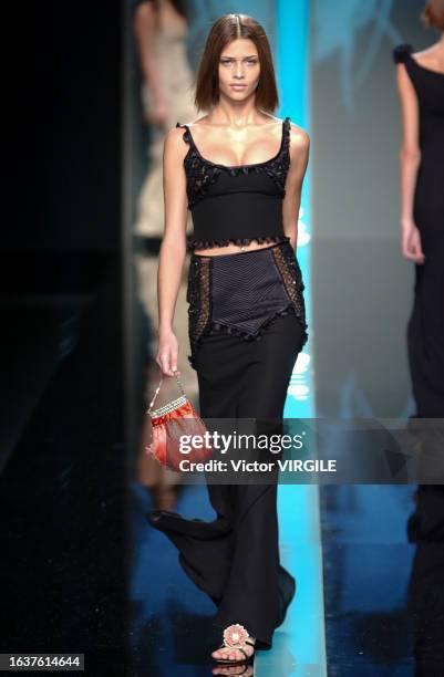 Ana Beatriz Barros walks the runway during the Valentino Ready to Wear Spring/Summer 2002 fashion show as part of the Paris Fashion Week on October...