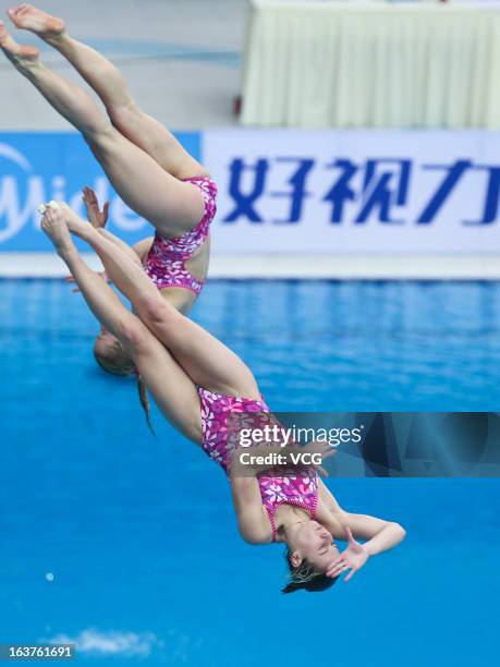 Anna Pysmenska and Olena Fedorova of Ukraine compete in the Women's 3m Springboard Synchro Final during day one of the FINA Diving World Series...