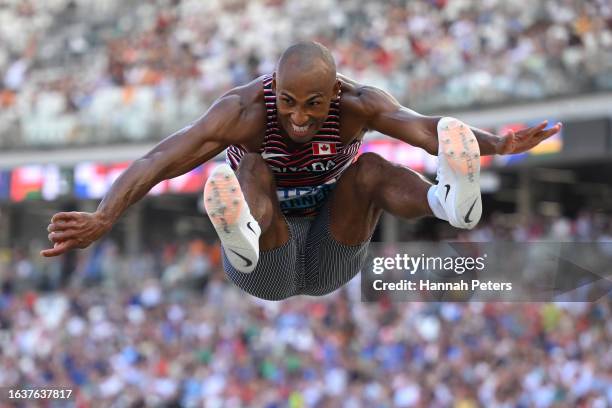 Damian Warner of Team Canada competes in the Long Jump leg of Decathlon during day seven of the World Athletics Championships Budapest 2023 at...