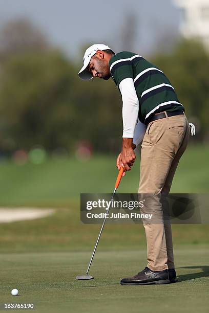 Abhijit Singh Chadha of India putts during day two of the Avantha Masters at Jaypee Greens Golf Club on March 15, 2013 in Delhi, India.
