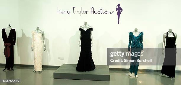 Catherine Walker black velvet and beaded evening gown worn for a Mario Testino shoot for Vanity Fair at Kensington Palace in 1997 is displayed at a...