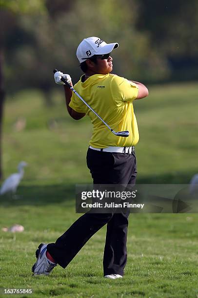 Thitiphun Chuayprakong of Thailand in action during day two of the Avantha Masters at Jaypee Greens Golf Club on March 15, 2013 in Delhi, India.