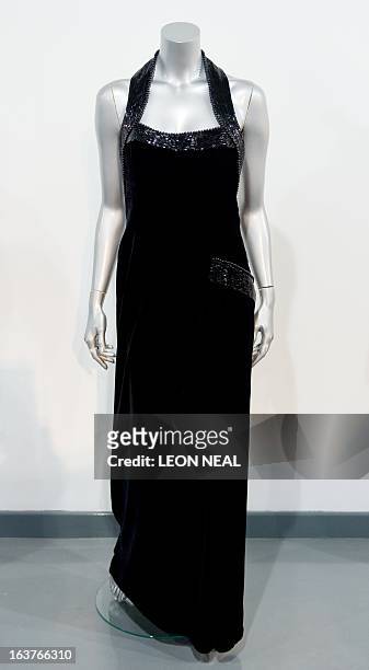 Catherine Walker evening gown worn by Britain's Princess Diana for a Vanity Fair photo-shoot with Mario Testino in 1997 is displayed at Kerry Taylor...