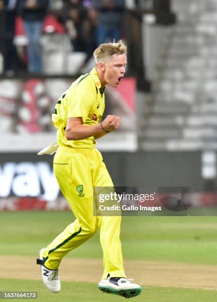 Nathan Ellis of Australia celebrates a wicket with teammates during the 2nd KFC T20 International match between South Africa and Australia at...