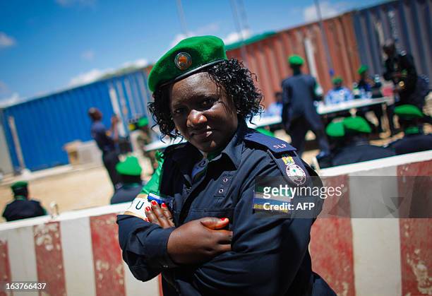 Picture taken on March 15, 2013 and released by the African Union-United Nations Information Support Team, shows an officer from the Sierra Leonean...