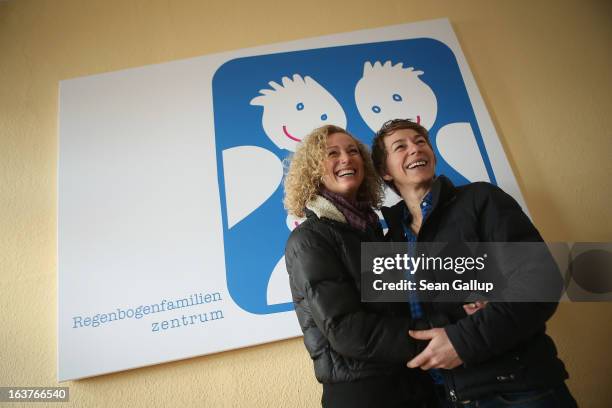 Lesbian couple Daniela Kuehling and Emina Sadikovic, who have a 12-year-old daughter, attend the opening of Germany's first gay parent counseling...