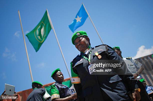 Picture taken on March 15, 2013 and released by the African Union-United Nations Information Support Team, shows officers from the Sierra Leonean...