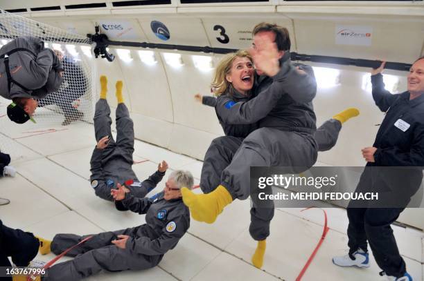 Civilian passengers of the Airbus A330 Zero-G, who are not astronauts nor scientists, enjoy the weightlessness, on March 15 during the first zero...