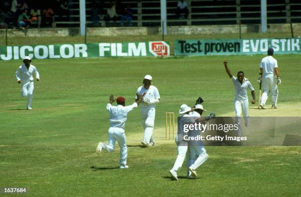 Ian Botham of England is caught behind off Malcolm Marshall of the West Indies during the Second Test match at Sabina Park in Kingston, Jamaica. The...