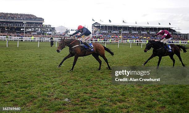 Barry Geraghty riding Bobs Worth win The Betfred Cheltenham Gold Cup Steeple Chase from Sir des Champs during Cheltenham Gold Cup Day at Cheltenham...