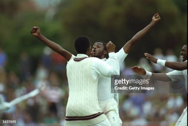 Courtney Walsh of the West Indies raises his arms in celebration after their victory in the Fourth Test match against Australia at the Adelaide Oval...