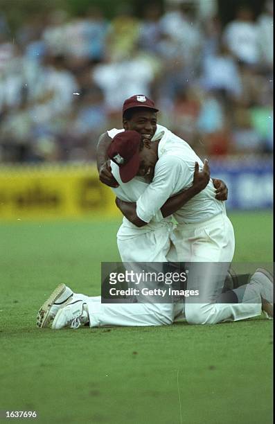 West Indies players celebrate after their victory in the Fourth Test against Australia at the Adelaide Oval in Australia. The West Indies won the...