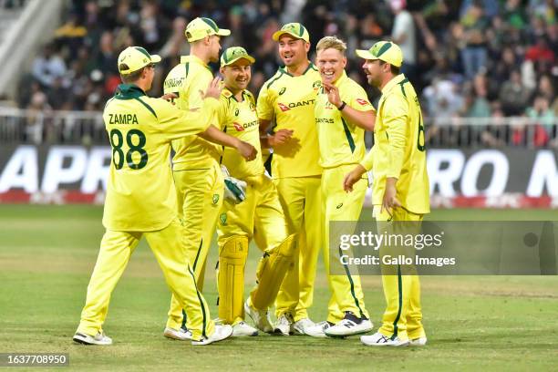 Nathan Ellis of Australia celebrates the dismissal of Dewald Brevis of South Africa with his teammates during the 2nd KFC T20 International match...