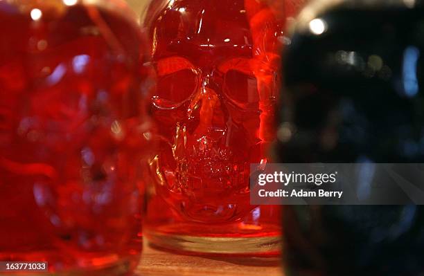 Bottles of 89 percent alcohol absinthe in the shape of skulls are seen at the Absinth Depot shop on March 15, 2013 in Berlin, Germany. The highly...